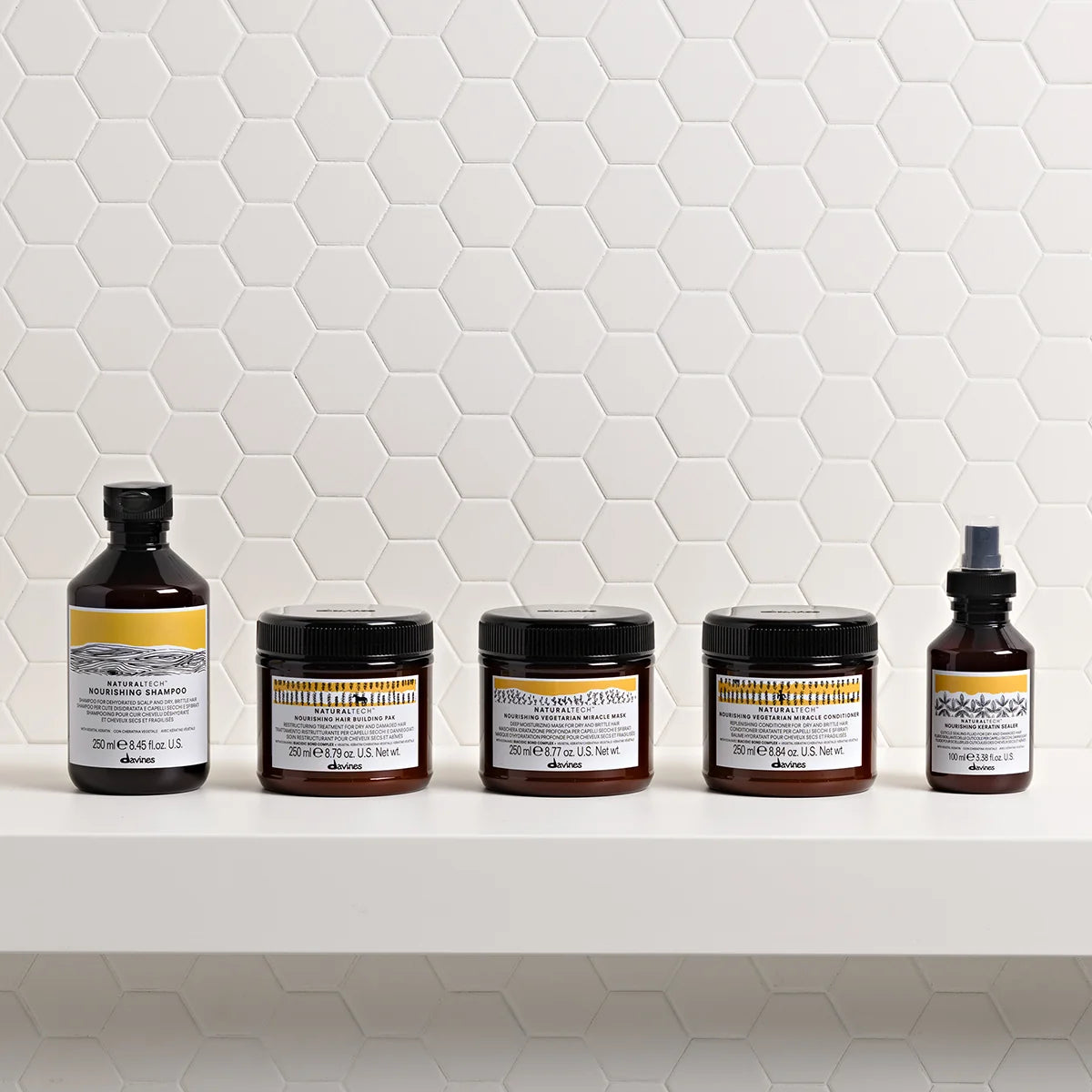 Gamme Davines Naturaltech Nourishing : shampooing, Hair Building Pak, masque, conditionneur et Keratin Sealer