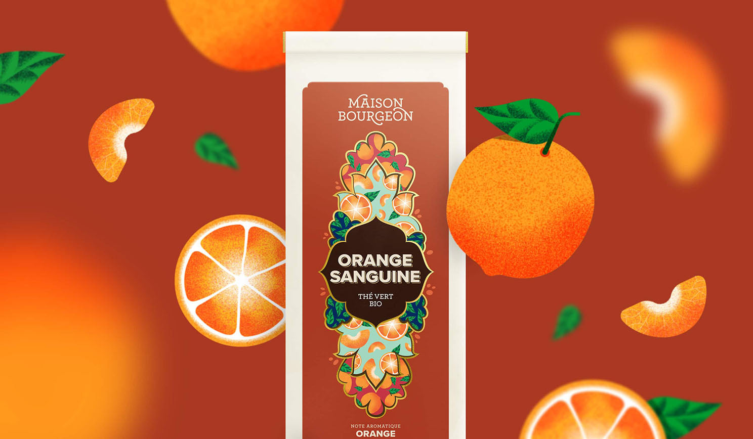 Paquet de thé vert bio Maison Bourgeon Orange Sanguine avec des illustrations d'oranges et de segments d'orange en arrière-plan.