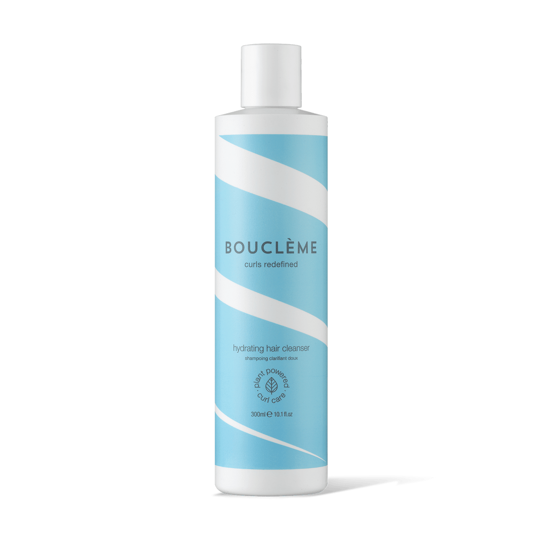 Bouclème Hydrating Hair Cleanser - Shampooing hydratant clarifiant doux pour cheveux bouclés, sans sulfates et enrichi en ingrédients naturels.
