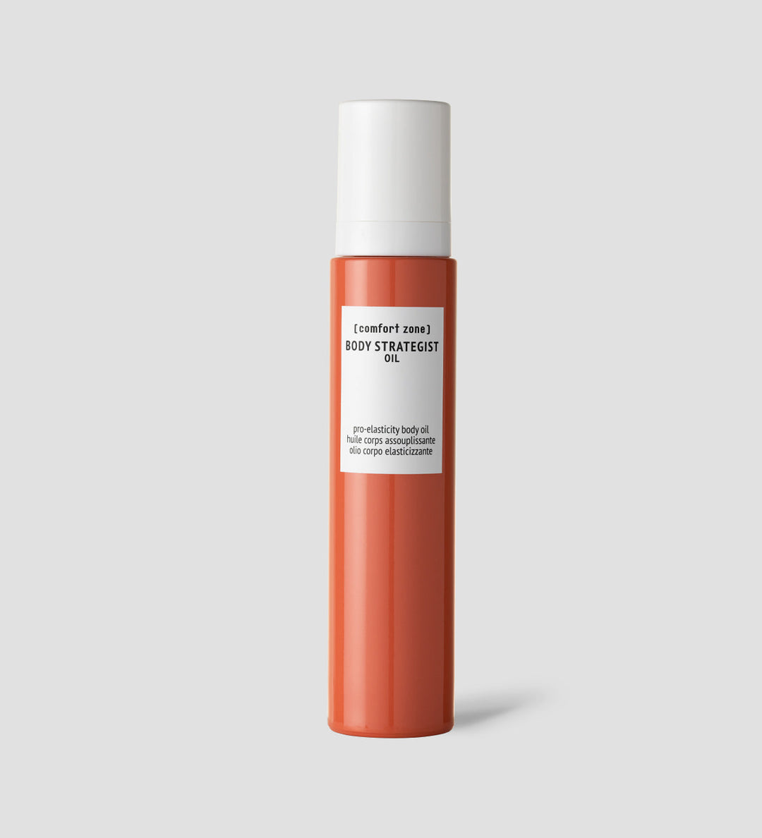 Flacon d'huile pour le corps Comfort Zone Body Strategist. Flacon cylindrique de couleur orange avec un bouchon blanc et une étiquette blanche, contenant une huile assouplissante pour le corps.