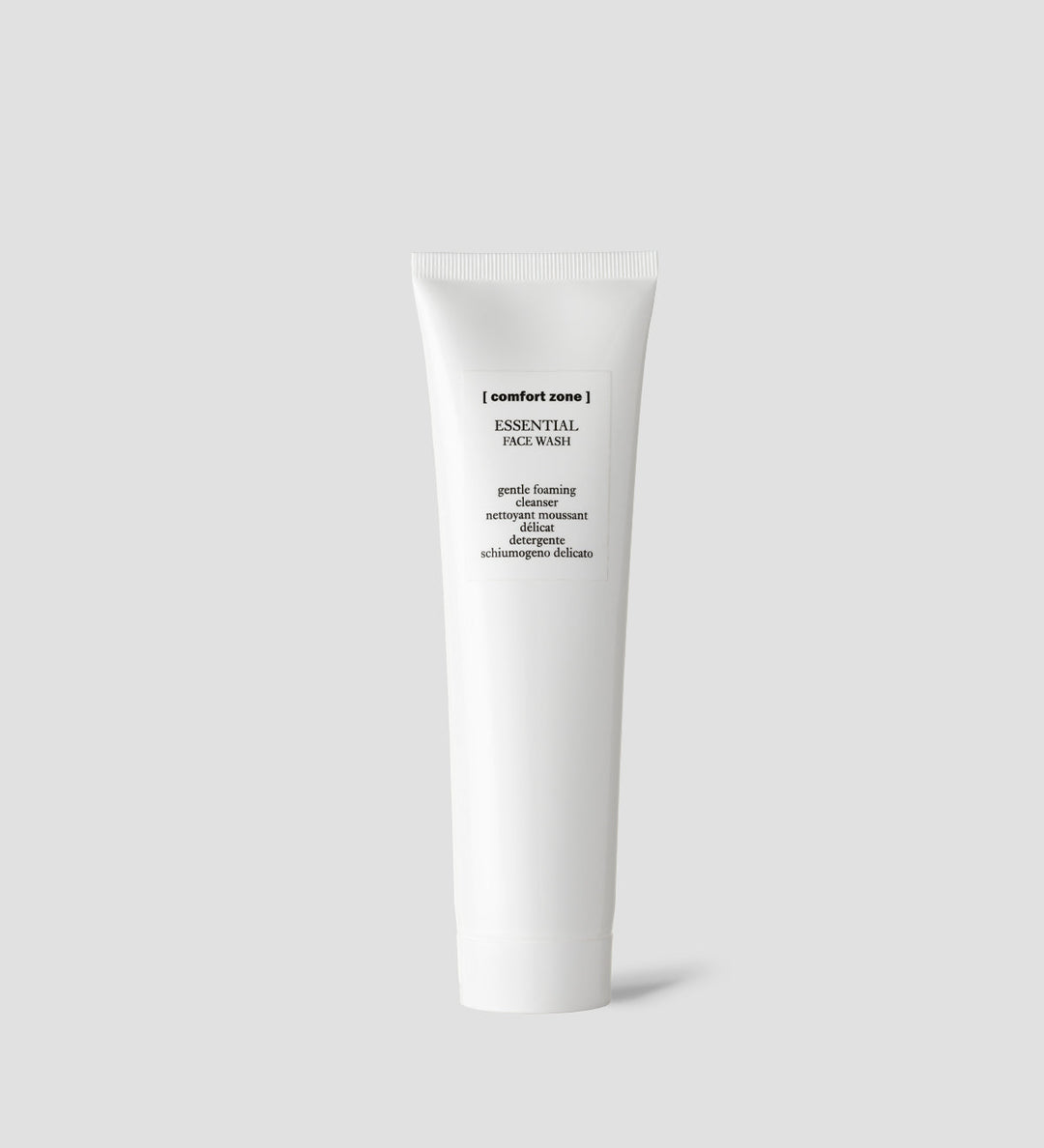 Tube de Comfort Zone Essential Face Wash, nettoyant moussant doux, sur fond gris clair.