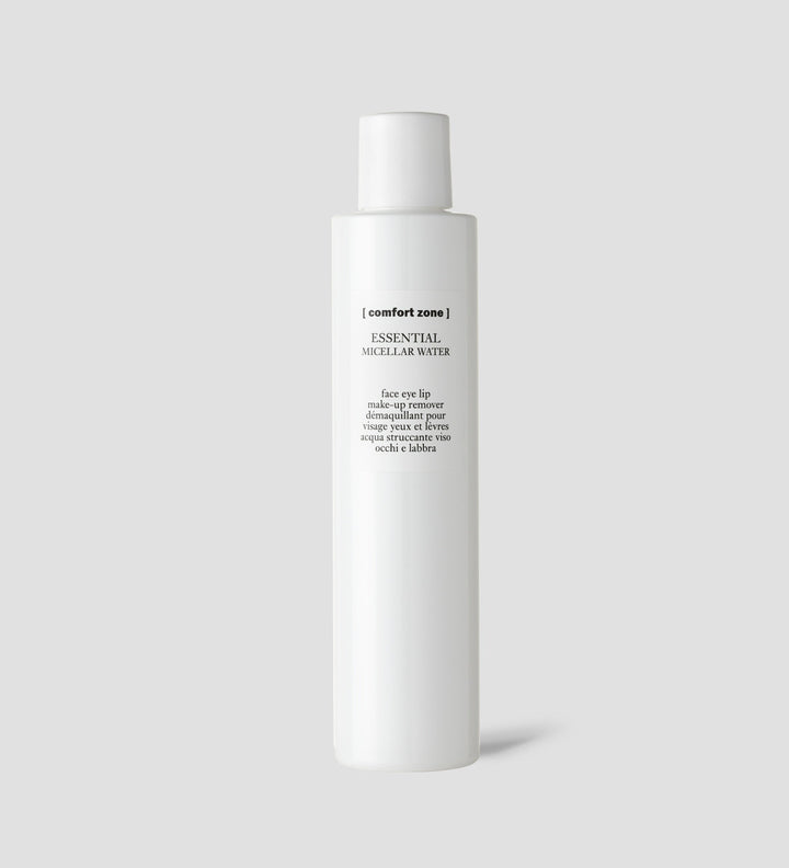 Flacon d'eau micellaire démaquillante Comfort Zone Essential Micellar Water, avec texte descriptif en noir sur fond blanc.