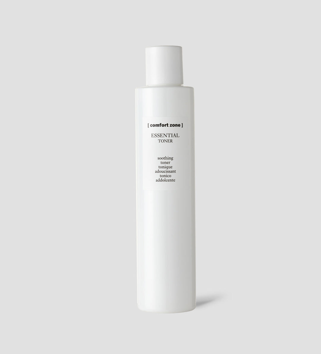 Bouteille de Comfort Zone Essential Toner, tonique apaisant, sur fond gris clair.