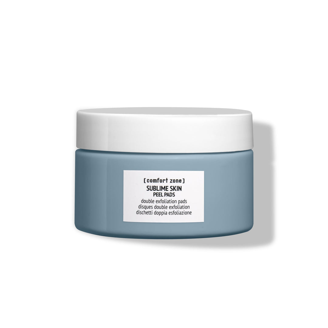 Pot de disques exfoliants SUBLIME SKIN PEEL PADS de Comfort Zone, soin double exfoliation pour lisser et renouveler la peau, idéal pour un teint éclatant et une peau douce, présenté en pot bleu au design épuré
