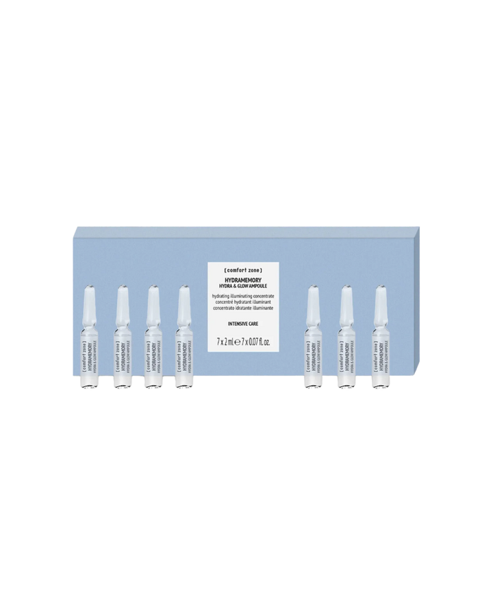 Ampoules hydratantes Comfort Zone Hydramemory Hydra & Glow. Soin intensif en ampoules monodoses pour booster l'hydratation et l'éclat de la peau. Formule illuminatrice et concentrée, idéale pour les peaux déshydratées. Coffret bleu contenant 7 ampoules en verre.