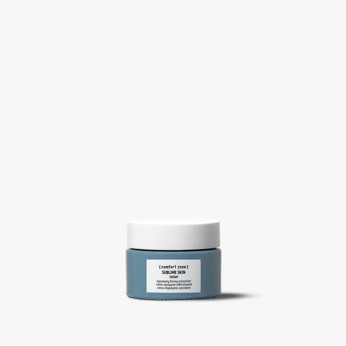 Petit pot bleu Comfort Zone Sublime Skin Cream 30 ml avec couvercle blanc, crème repulpante raffermissante sur fond blanc.