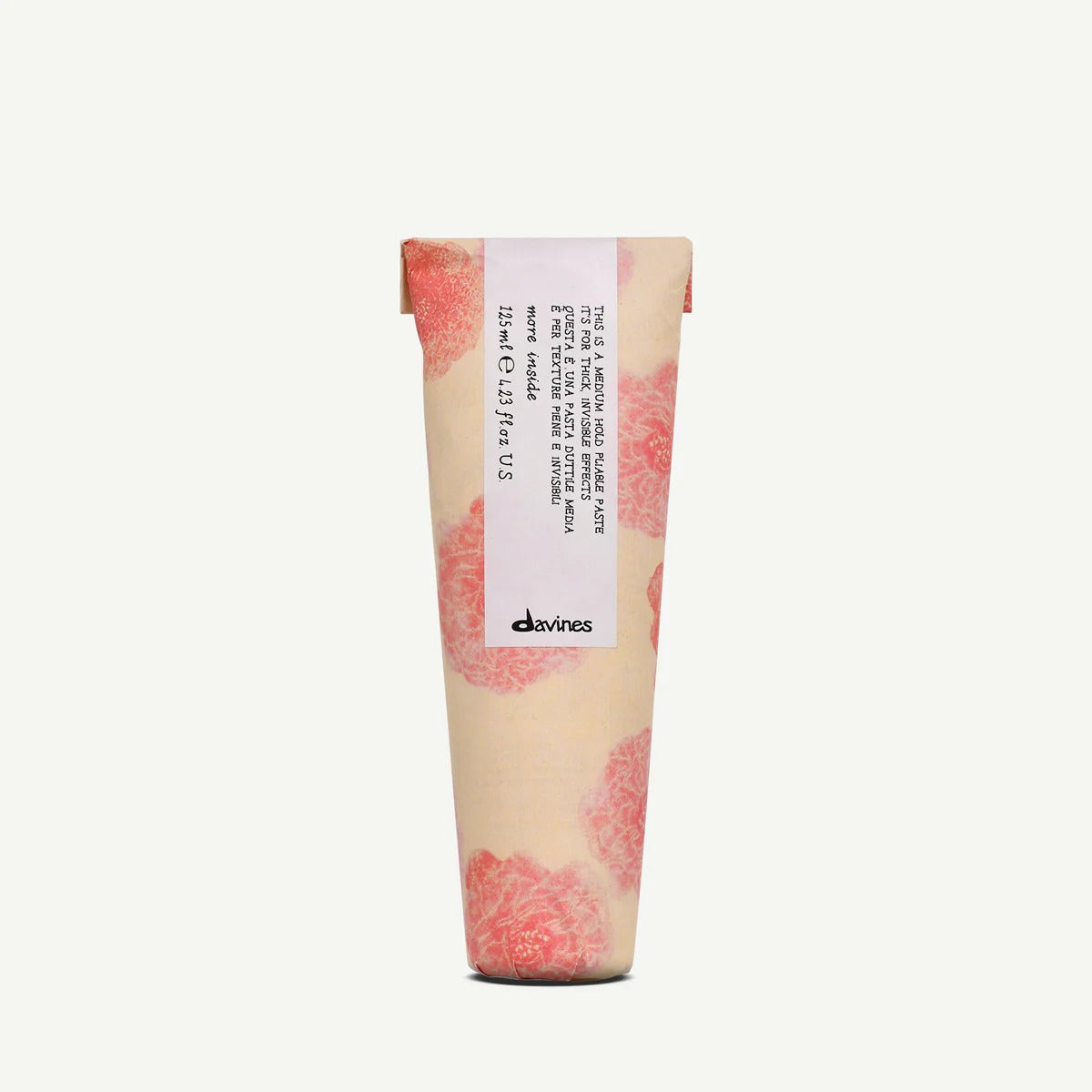Tube 125 ml Davines Pliable Paste enveloppé de papier floral rose – packaging écoresponsable édition More Inside.