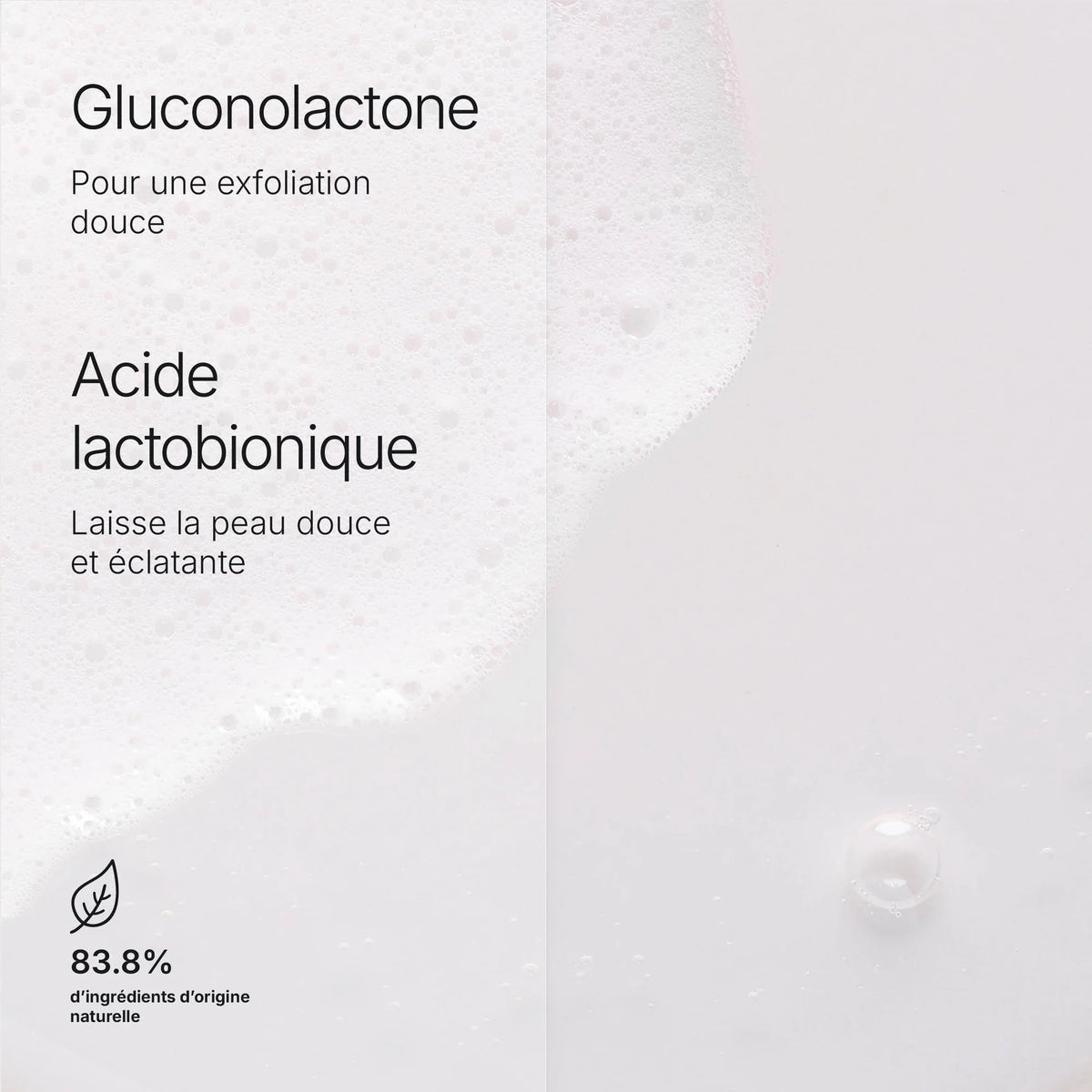 Visuel des actifs gluconolactone et acide lactobionique de Luminant Milky Cleanser, sur fond de mousse blanche.