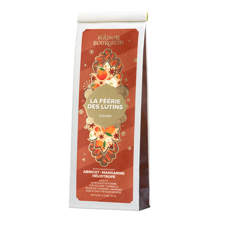 Thé Oolong La Féérie des Lutins de Maison Bourgeon. Mélange aromatisé aux notes d'abricot, mandarine et héliotrope. Infusion festive à base de thé Oolong, morceaux de pomme, cannelle, écorces d'orange, amandes, anis étoilé et pétales de rose. Sachet hermétique pour une conservation optimale des arômes.