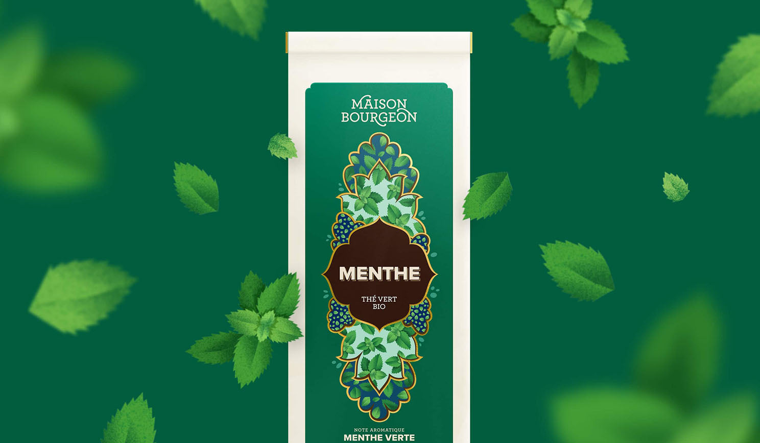 Paquet de thé vert bio Maison Bourgeon Menthe avec des illustrations de feuilles de menthe en arrière-plan.